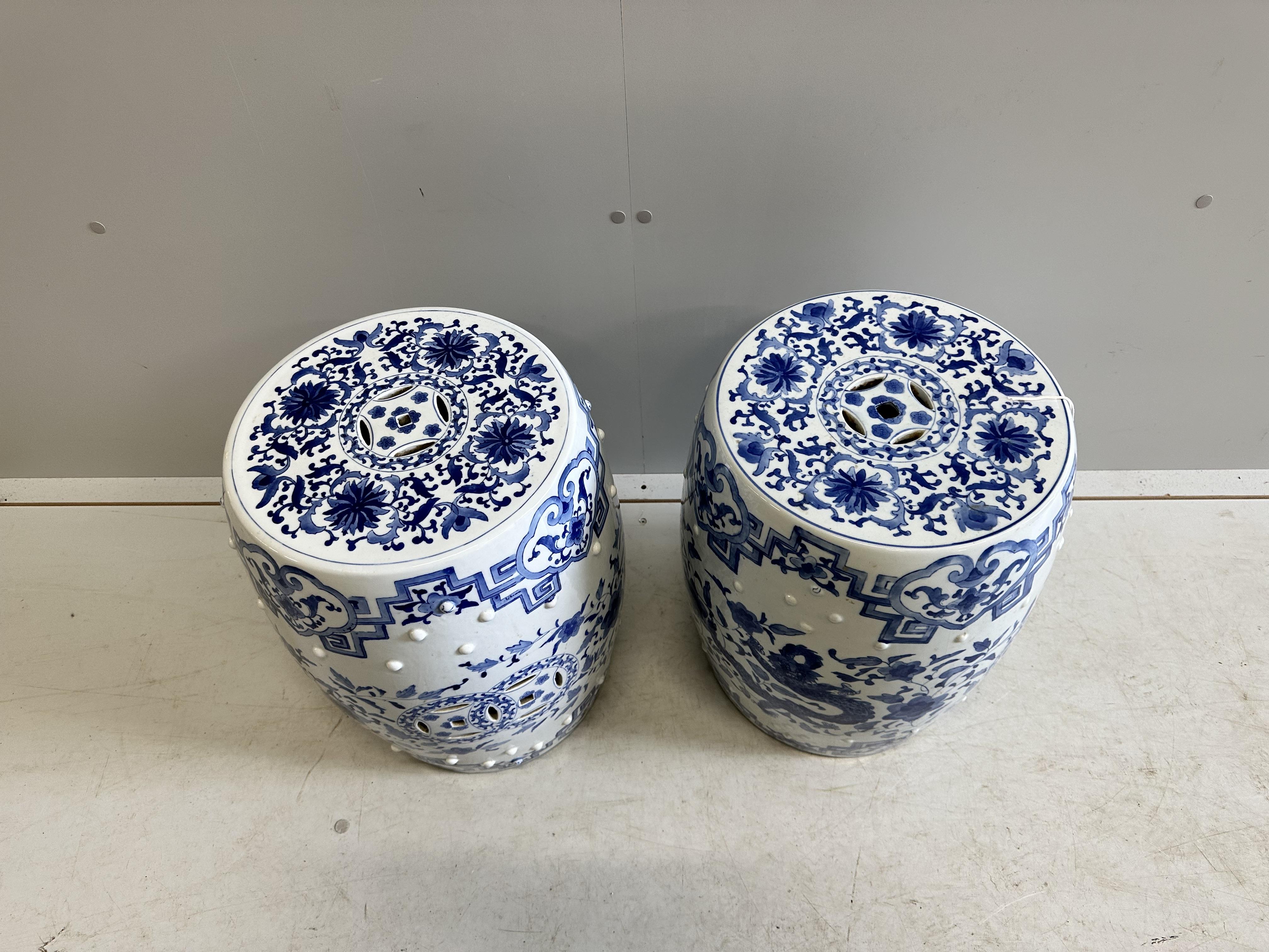 A pair of modern Chinese blue and white earthenware seats, height 46cm